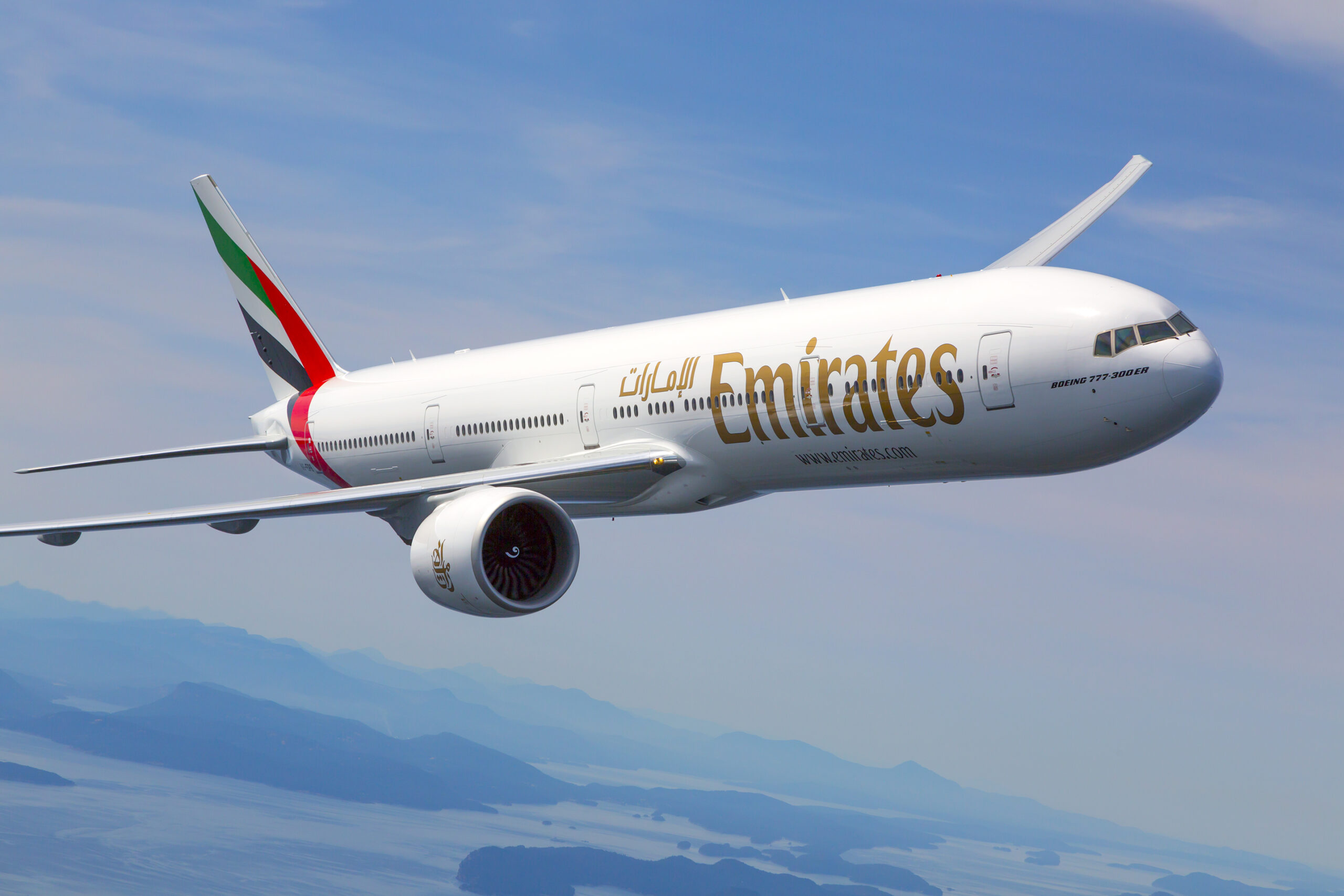 Emirates Boeing 777-300ER photographed on August 17, 2015 from Wolfe Air Aviation's Lear 25B.