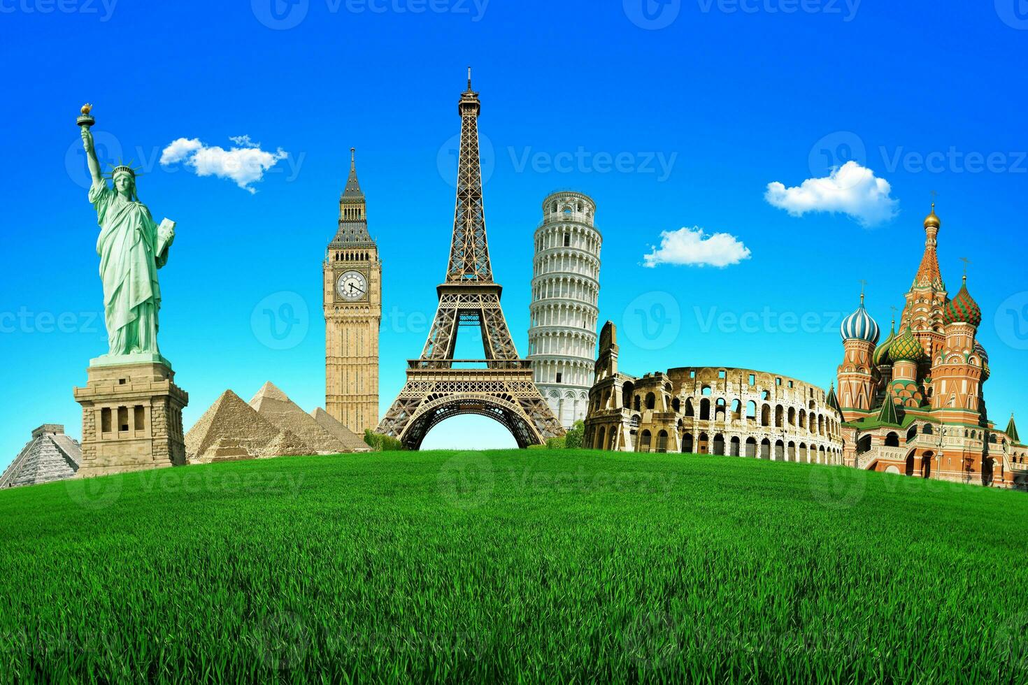 concept-of-travel-green-field-with-the-wonders-of-the-world-around-the-world-tours-photo